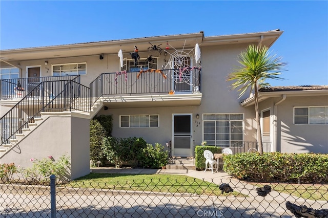 exterior space with a balcony