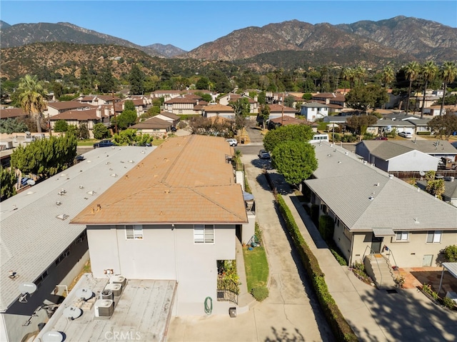 bird's eye view with a mountain view