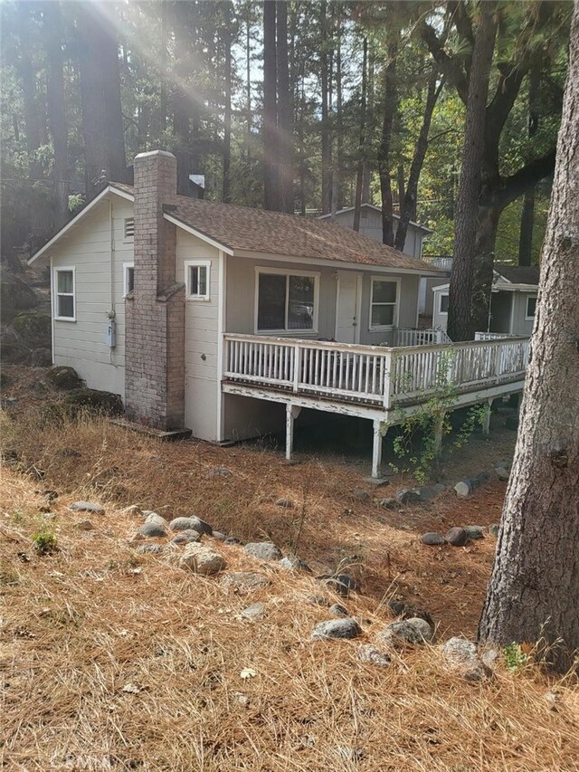 17010 State Highway 175, Cobb, CA 95461 - ranch-style house with a chimney and a wooden deck