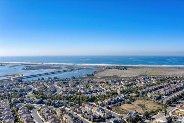 bird's eye view with a water view and a residential view