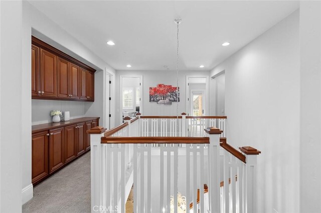 bar featuring recessed lighting and light colored carpet