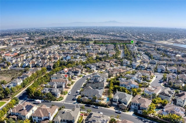 birds eye view of property with a residential view