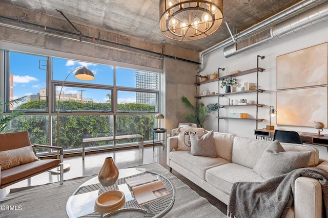 living room with a healthy amount of sunlight and an inviting chandelier