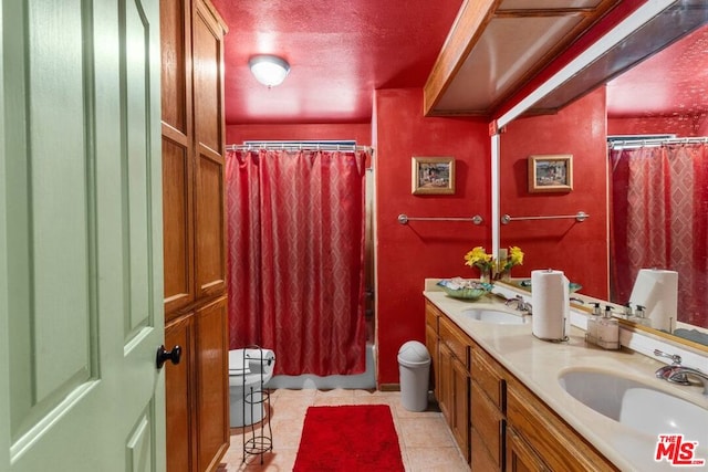 full bathroom featuring toilet, shower / bath combo, vanity, and tile patterned floors