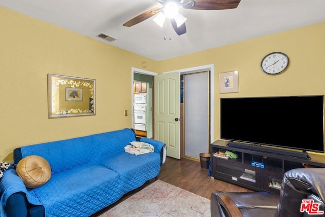 living room with dark hardwood / wood-style floors