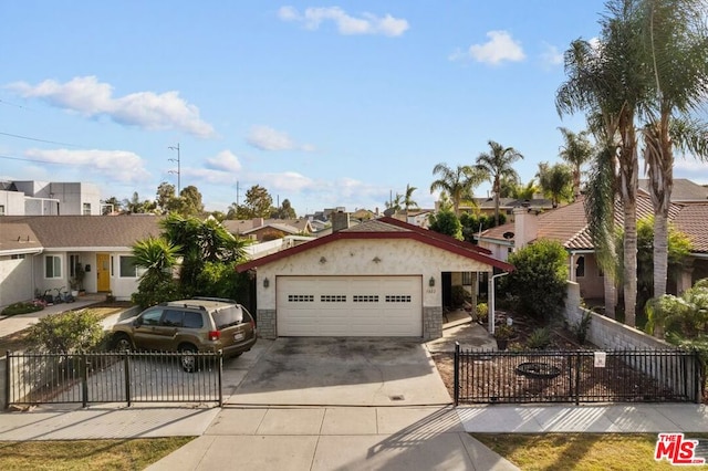 view of front of home with a garage