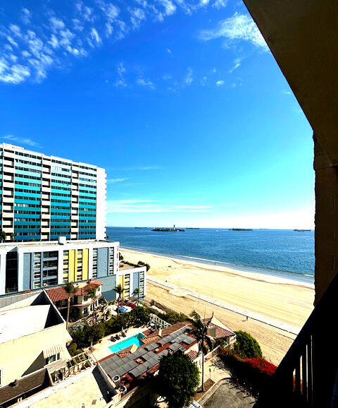 water view featuring a beach view