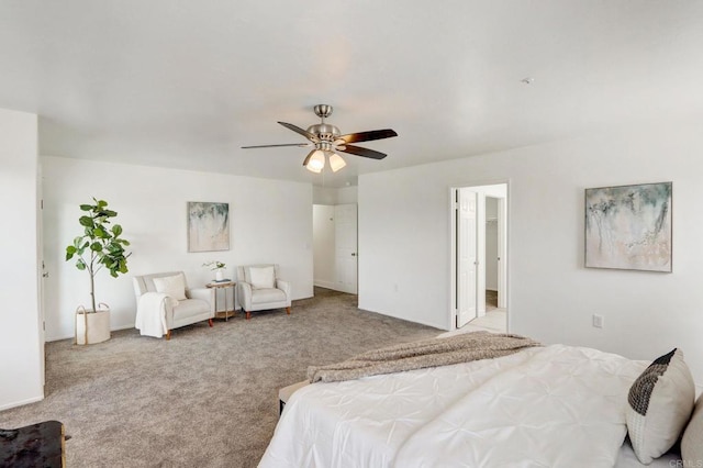 bedroom featuring ceiling fan and light carpet