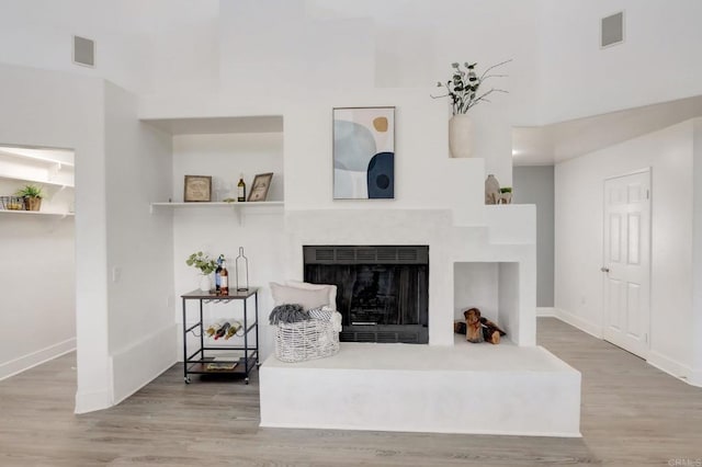 living room with hardwood / wood-style floors