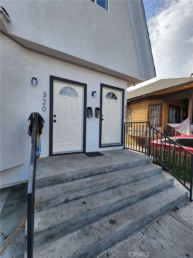 doorway to property with a porch