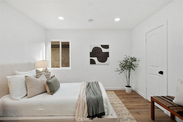 bedroom featuring light hardwood / wood-style floors