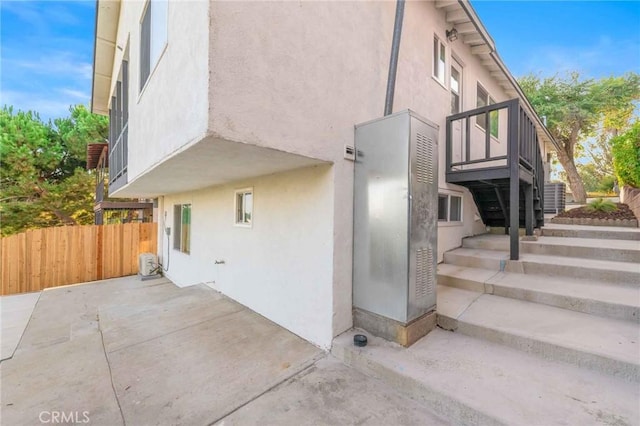 view of property exterior featuring a patio area