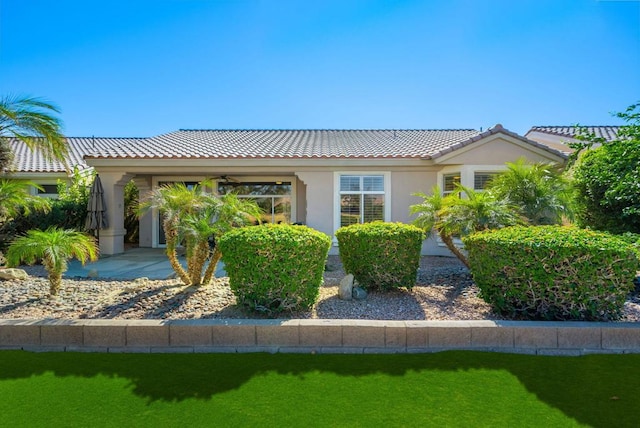 view of side of home featuring a yard