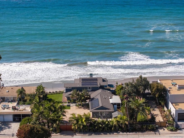 aerial view featuring a water view and a beach view