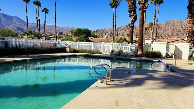 view of pool featuring a mountain view