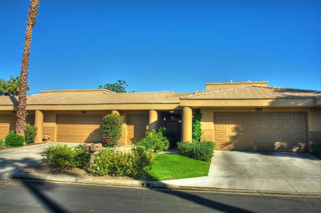 prairie-style house featuring a garage