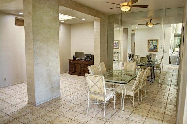 dining area featuring ceiling fan and light tile patterned flooring