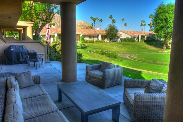 view of patio / terrace featuring an outdoor living space and area for grilling