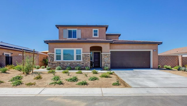 view of front of home featuring a garage