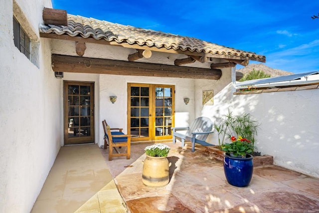 view of patio featuring french doors