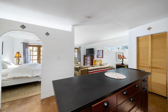 kitchen featuring carpet and a center island