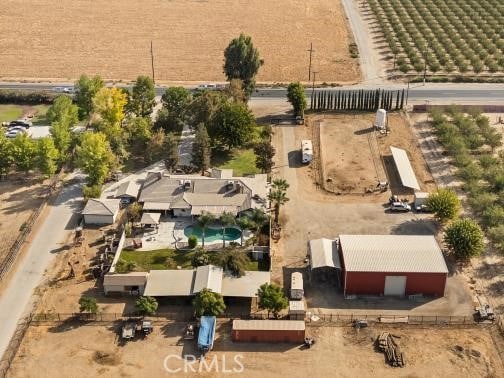 birds eye view of property featuring a rural view