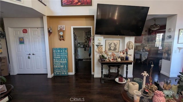 interior space with dark hardwood / wood-style floors