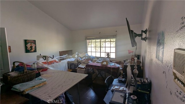 misc room featuring dark hardwood / wood-style flooring and vaulted ceiling