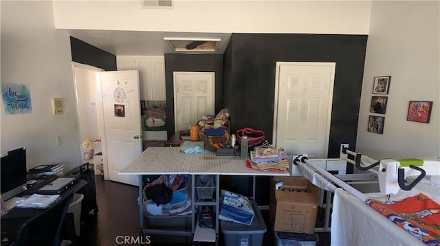 kitchen with white cabinetry and a breakfast bar area