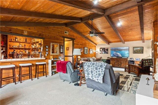 24601 Deertrail Dr, Tehachapi, CA 93561 - carpeted living room featuring wooden walls, wood ceiling, and ceiling fan