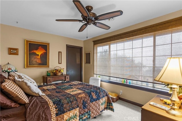 bedroom featuring carpet and ceiling fan