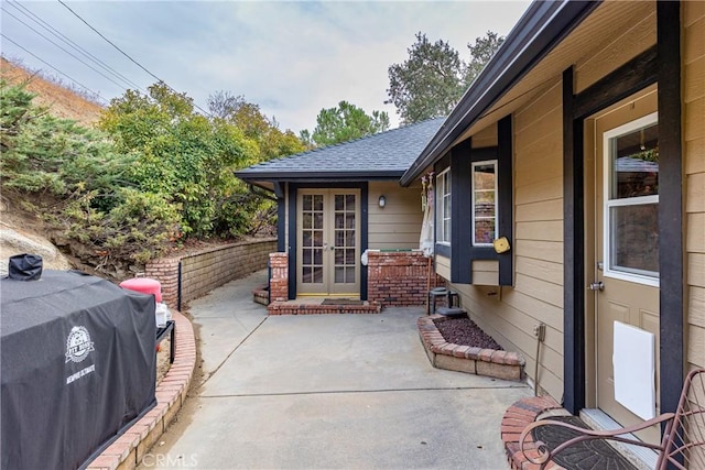 view of patio featuring a grill