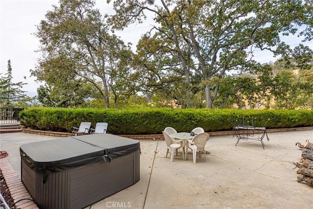 view of patio featuring a hot tub