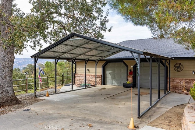 view of car parking featuring a garage and a carport