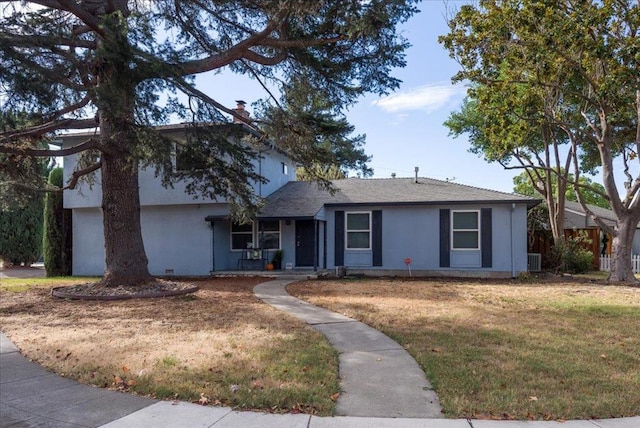 view of front facade featuring a front yard