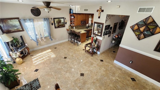 living room featuring ceiling fan