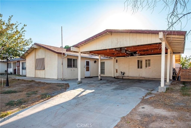 exterior space featuring a carport