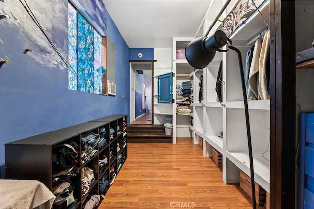 mudroom with light hardwood / wood-style floors