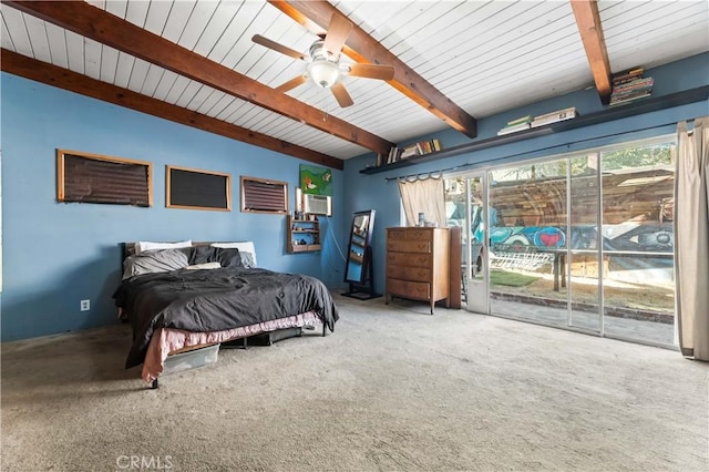 carpeted bedroom with access to outside, ceiling fan, and beam ceiling