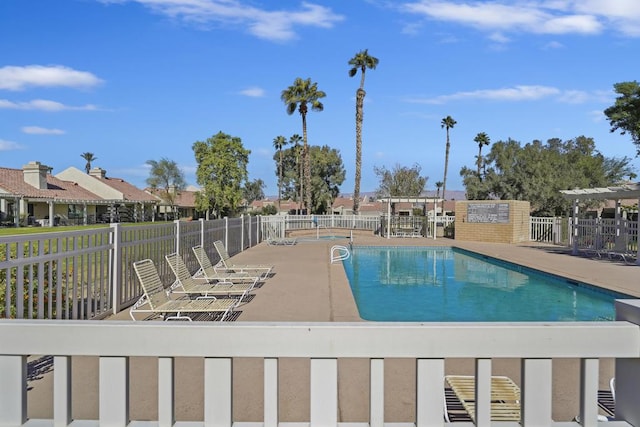 view of pool featuring a patio