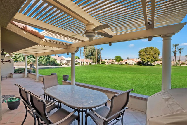 view of patio / terrace with a pergola, area for grilling, and ceiling fan