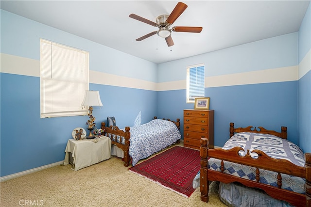 bedroom featuring carpet flooring and ceiling fan