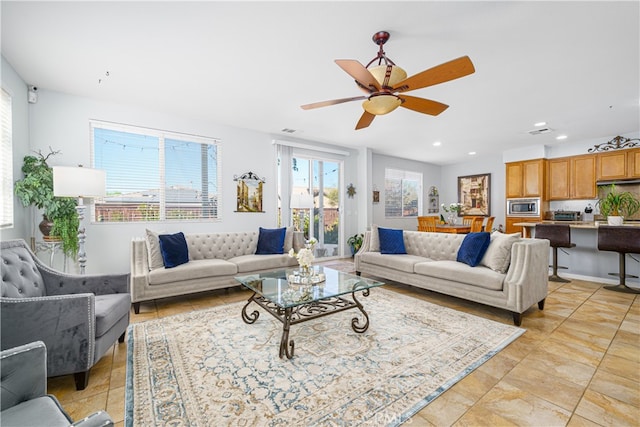 living room with ceiling fan