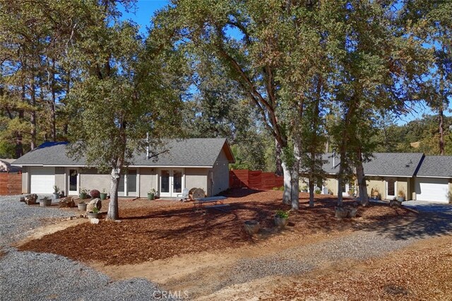 ranch-style home with a garage