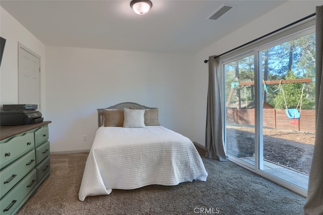 bedroom with carpet flooring and access to outside