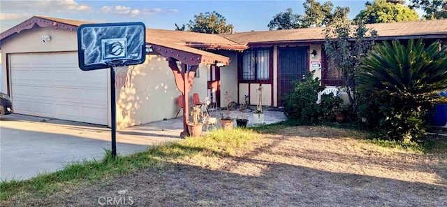 single story home with a garage