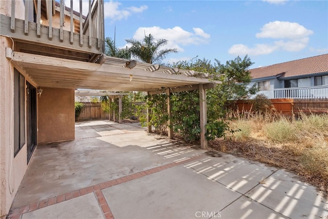 view of patio featuring a carport