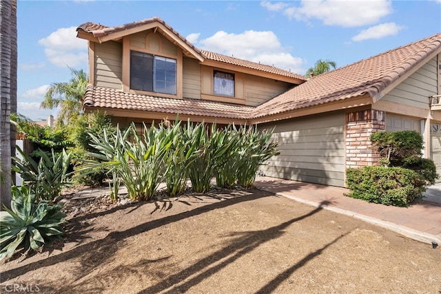 exterior space featuring a garage