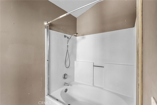 bathroom with shower / tub combination