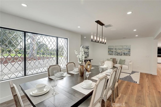 dining room with light hardwood / wood-style flooring